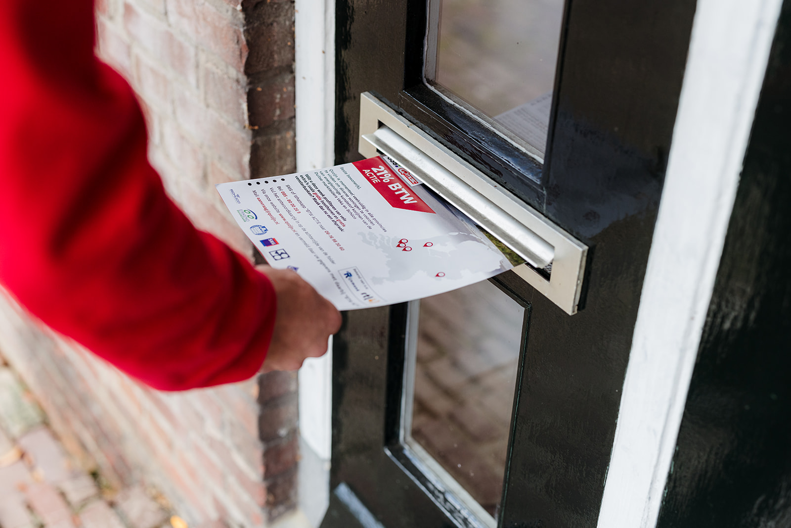 Qozijn flyer met 21% btw actie